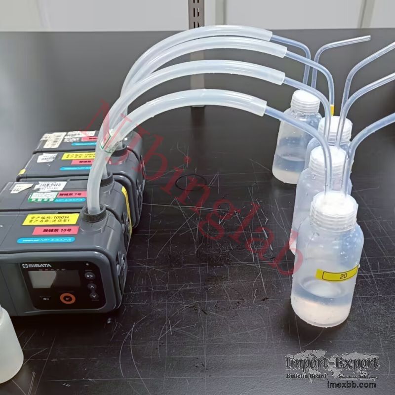 PFA gas washing bottle connected to air sampling pump